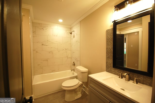 full bathroom featuring tiled shower / bath, ornamental molding, toilet, and vanity