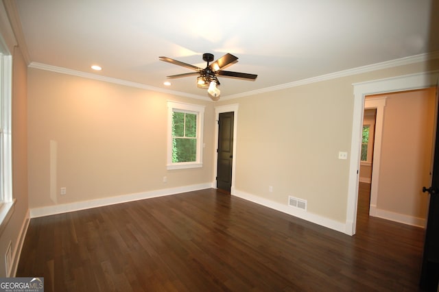 spare room featuring ornamental molding, ceiling fan, and dark hardwood / wood-style flooring