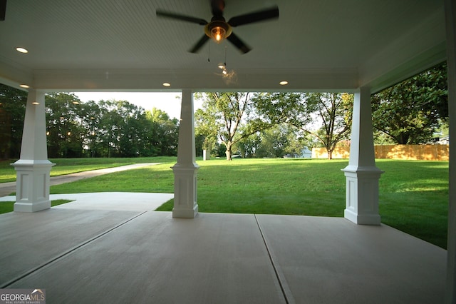 view of patio featuring ceiling fan