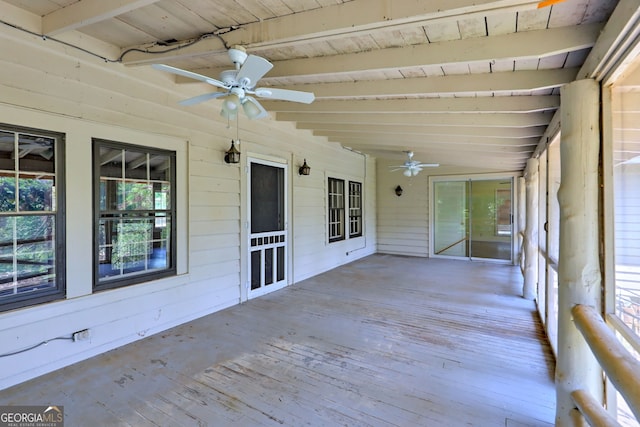 exterior space with ceiling fan