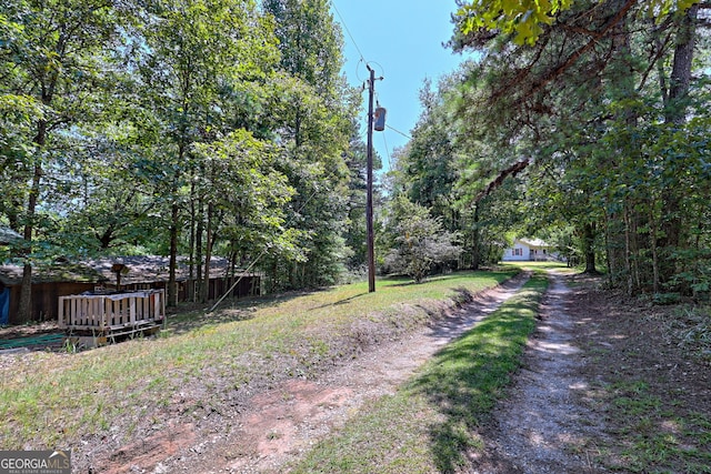 view of road featuring driveway