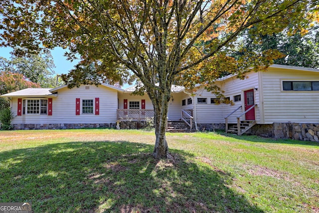 view of front of house with a front lawn