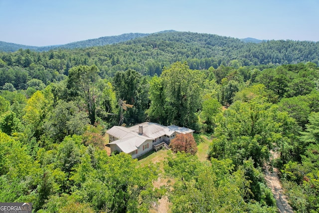 aerial view with a wooded view