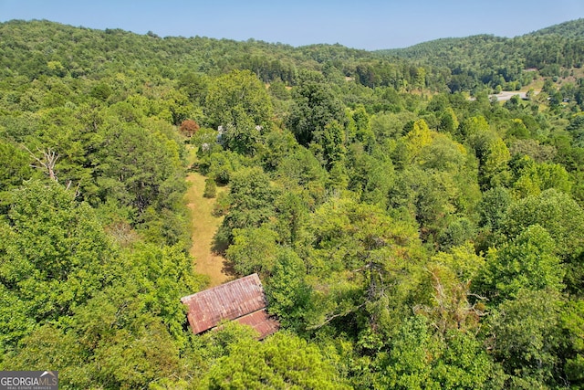 bird's eye view featuring a view of trees