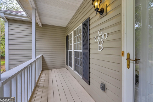 balcony featuring a porch