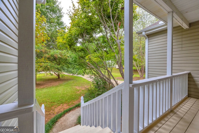 deck featuring a yard