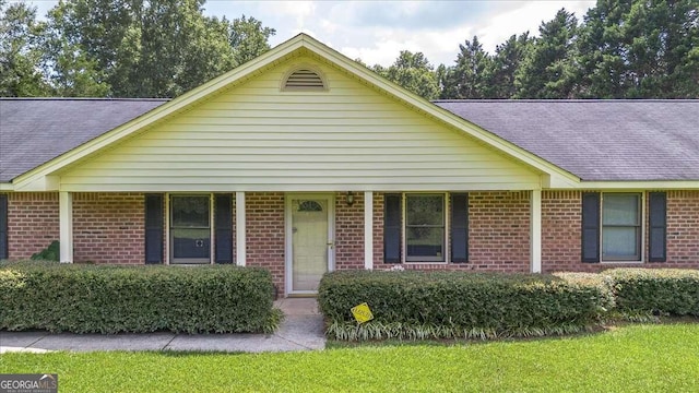 view of front of home featuring covered porch