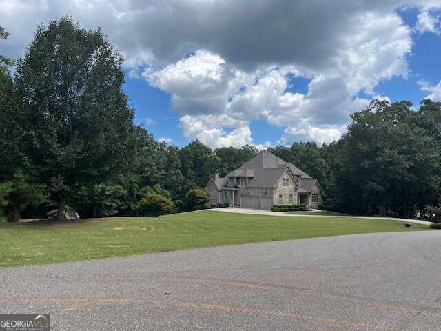 exterior space with a garage and a front yard