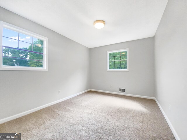 view of carpeted spare room