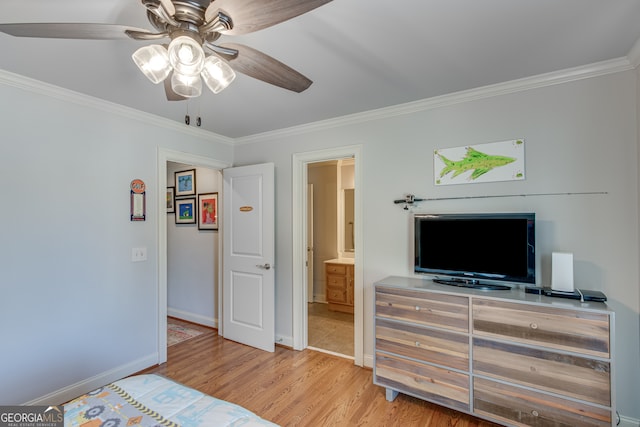 bedroom with light hardwood / wood-style flooring, ceiling fan, crown molding, and ensuite bathroom