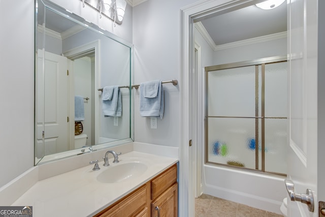 full bathroom with combined bath / shower with glass door, tile patterned flooring, vanity, and ornamental molding