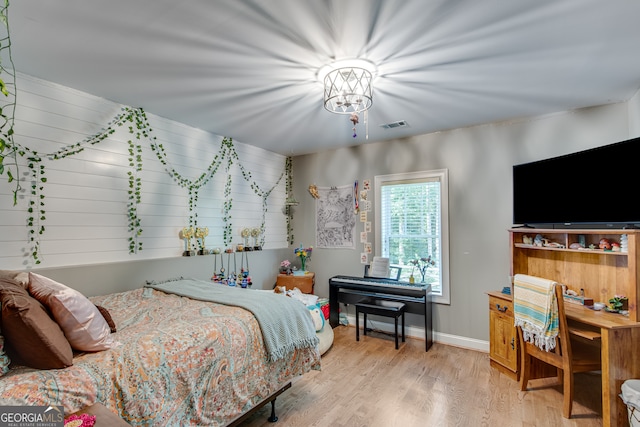 bedroom featuring light wood-type flooring