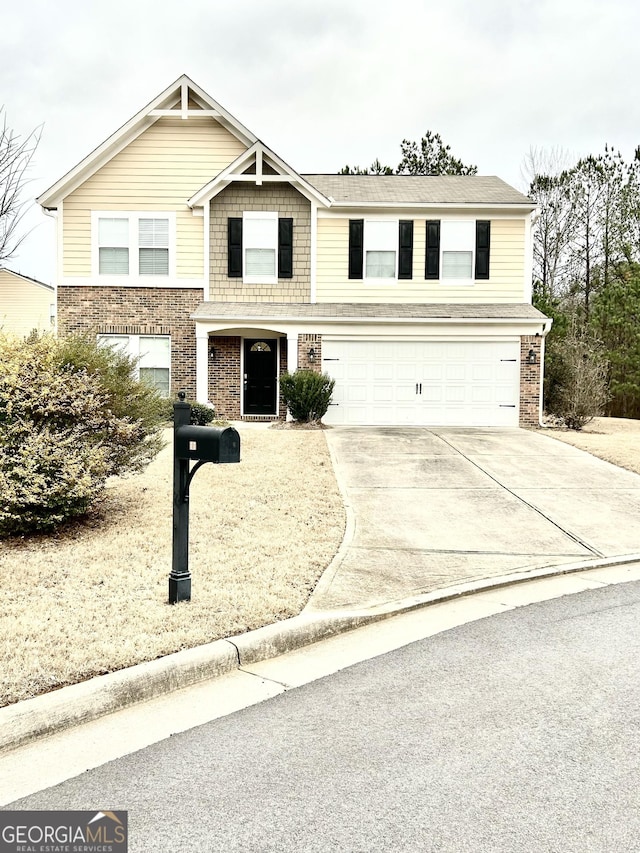 view of front property with a garage