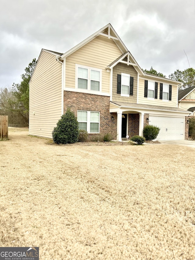 view of front of property featuring a garage