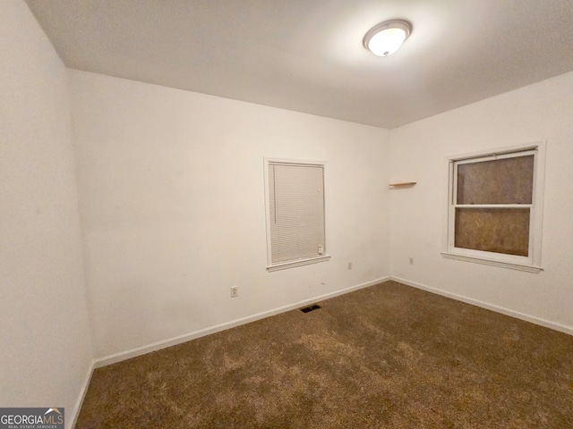 view of carpeted spare room