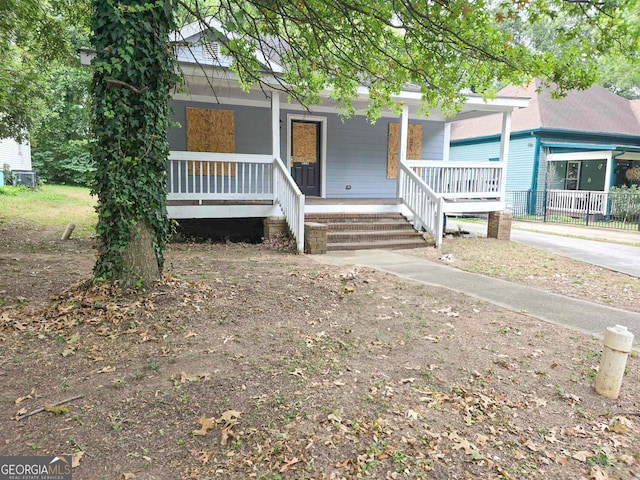 view of front of home featuring covered porch