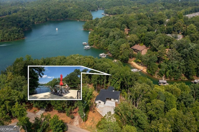 birds eye view of property featuring a water view