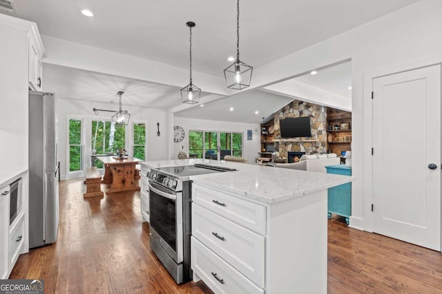 kitchen featuring stainless steel appliances, hanging light fixtures, a kitchen island, dark wood-type flooring, and white cabinets