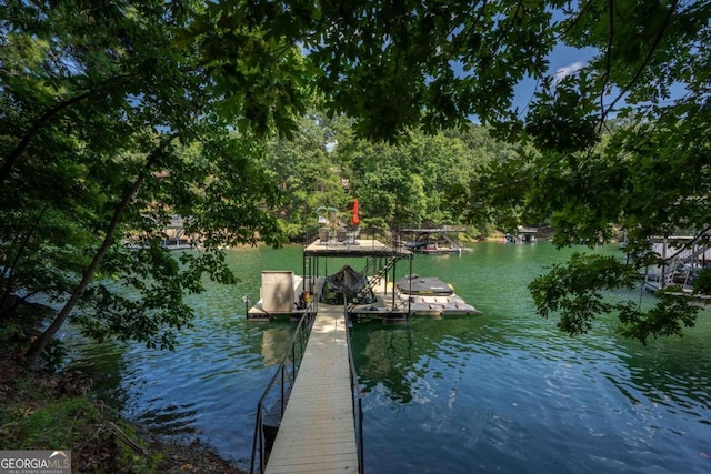 view of dock with a water view