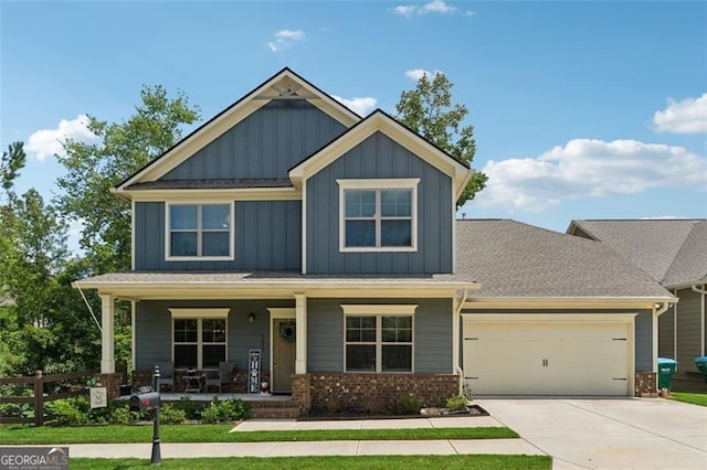 craftsman-style house with covered porch and a garage