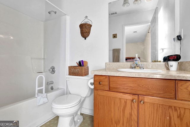 full bathroom featuring toilet, bathing tub / shower combination, and vanity