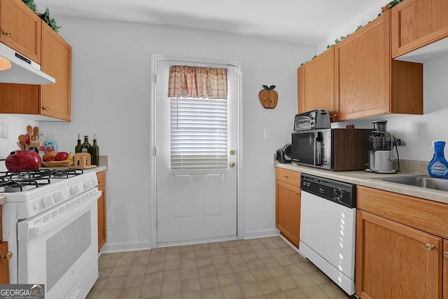 kitchen featuring white appliances