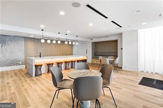 dining area with light wood-type flooring