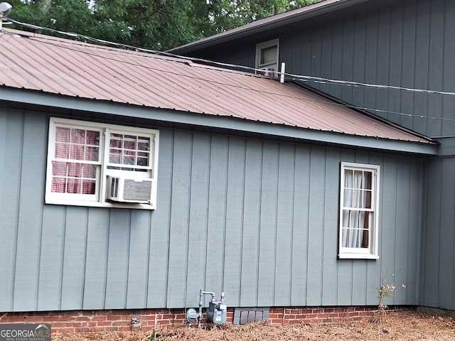 view of side of property featuring cooling unit