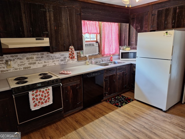 kitchen featuring cooling unit, sink, white appliances, exhaust hood, and light hardwood / wood-style floors