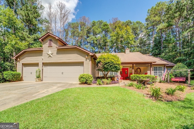 ranch-style home with a garage and a front yard