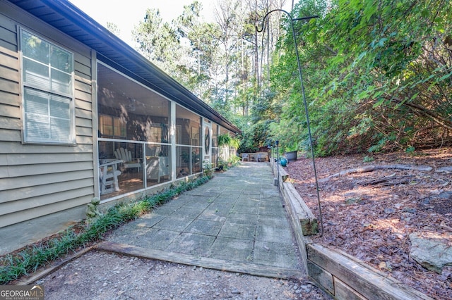 view of yard with a sunroom