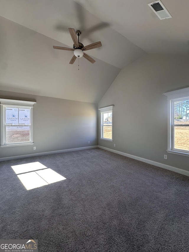 bonus room featuring carpet, ceiling fan, plenty of natural light, and lofted ceiling