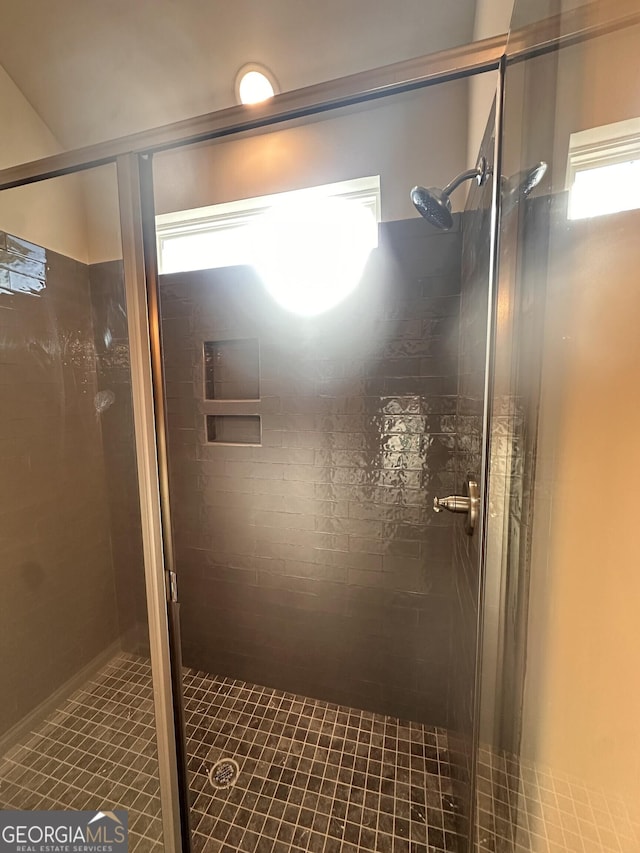 bathroom featuring an enclosed shower