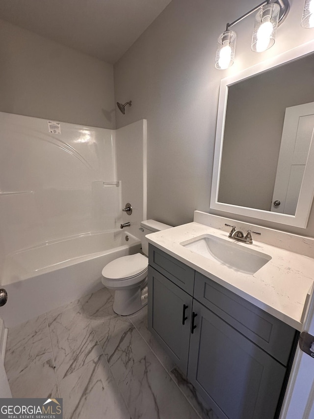 full bathroom featuring toilet, vanity, and shower / bathtub combination