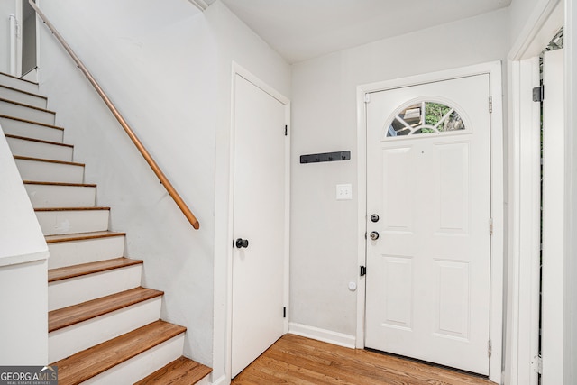 entrance foyer with light hardwood / wood-style floors