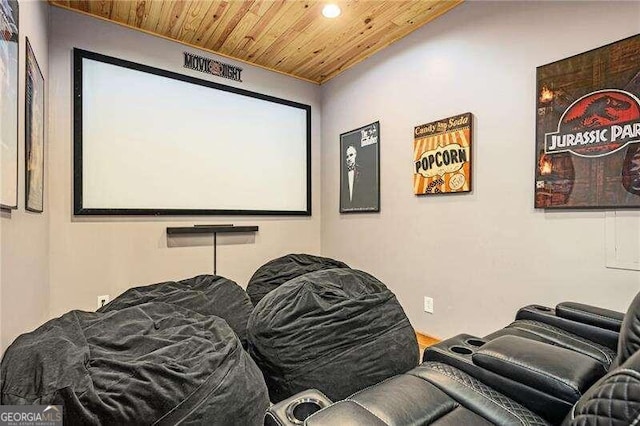 home theater room featuring wooden ceiling