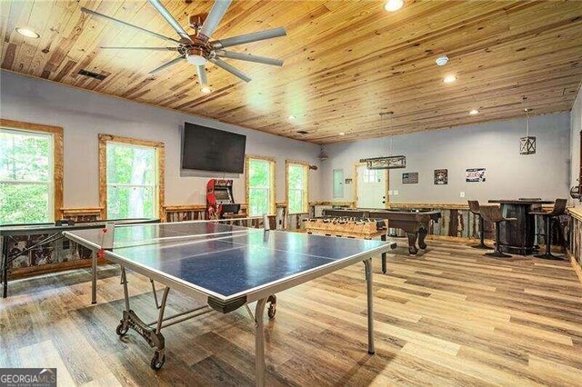 rec room featuring light wood-type flooring, wood ceiling, ceiling fan, and billiards