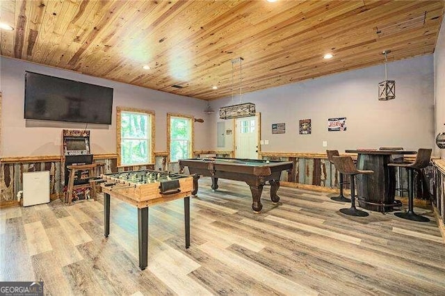 playroom with wood ceiling, indoor bar, light hardwood / wood-style floors, and pool table