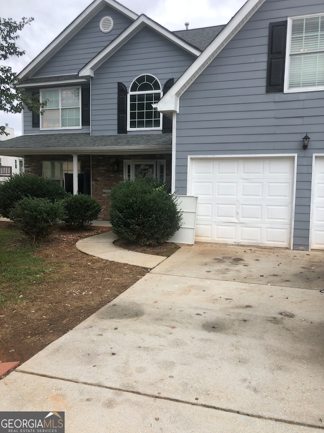 view of front property featuring a garage