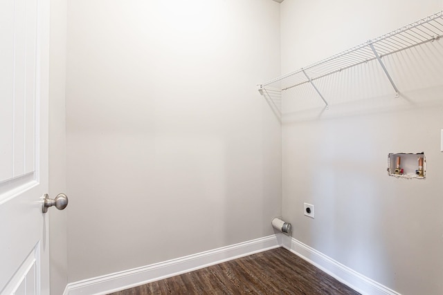 washroom featuring hardwood / wood-style flooring, electric dryer hookup, and washer hookup