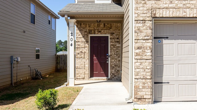 entrance to property featuring a garage