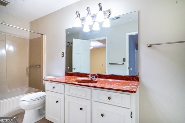 full bathroom with a textured ceiling, shower / bath combination, vanity, and toilet