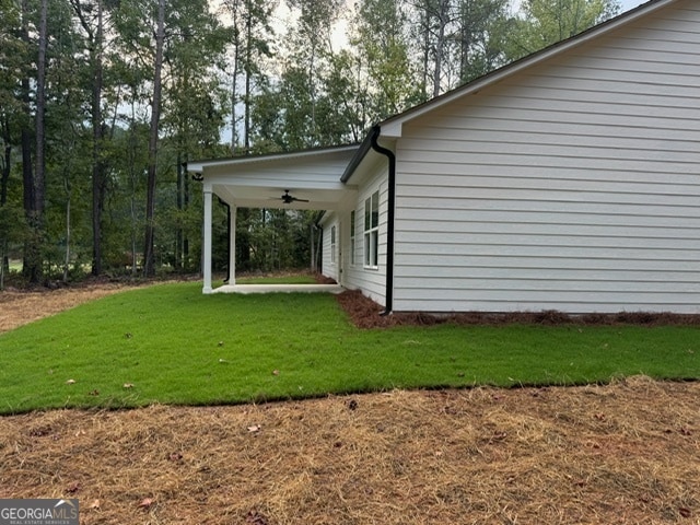 view of patio with ceiling fan