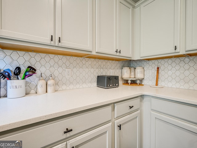 interior space with decorative backsplash