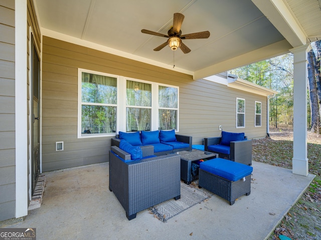 view of patio featuring a ceiling fan and outdoor lounge area