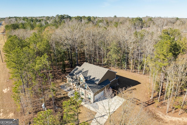 bird's eye view with a view of trees