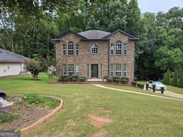 view of front of home with a front yard