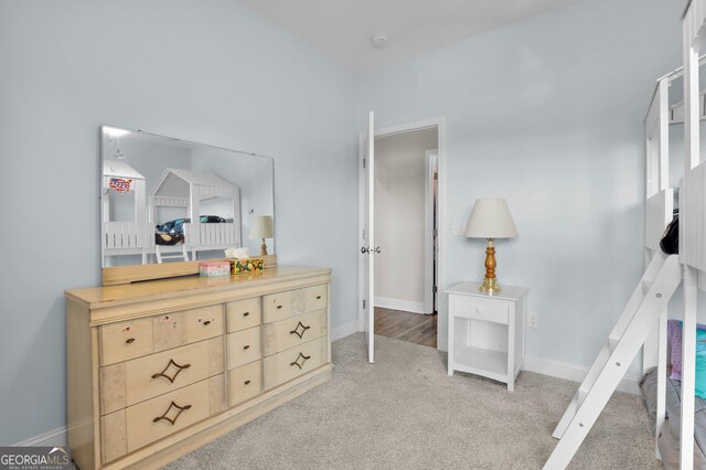 bedroom with light hardwood / wood-style flooring