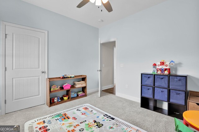 carpeted bedroom featuring ceiling fan