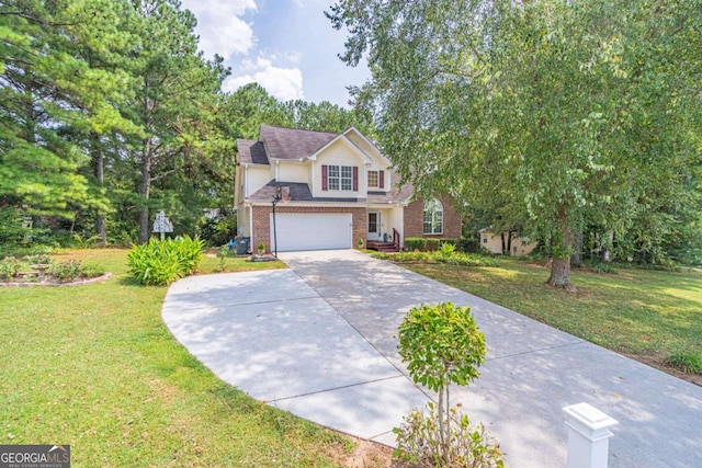 view of front of home featuring a garage and a front lawn